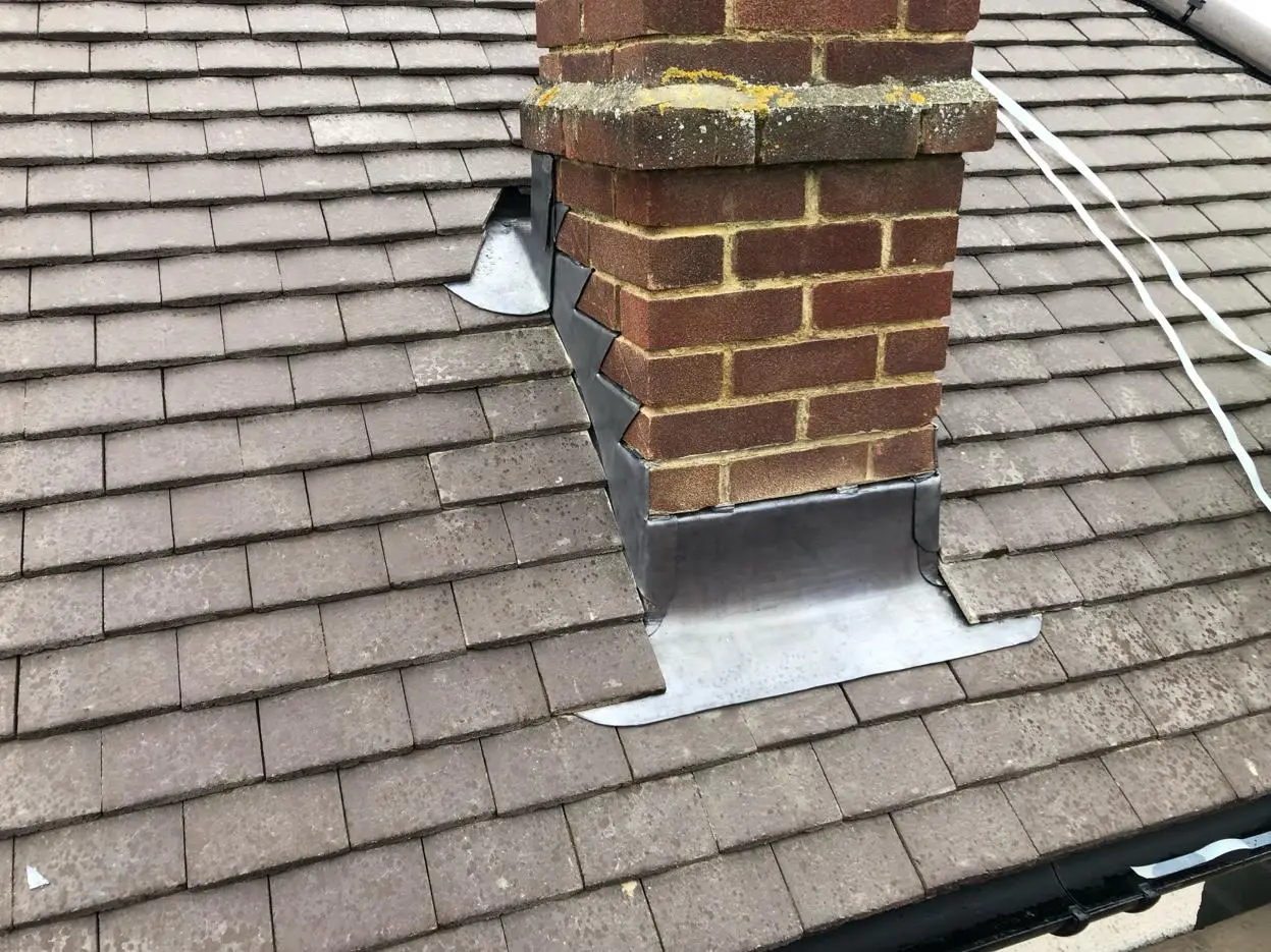 Lead flashing repair at chimney