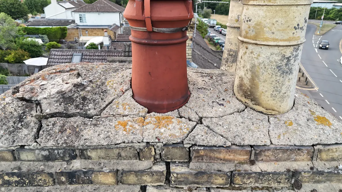 Cracked chimney mortar found during IKON pre-purchase roof survey