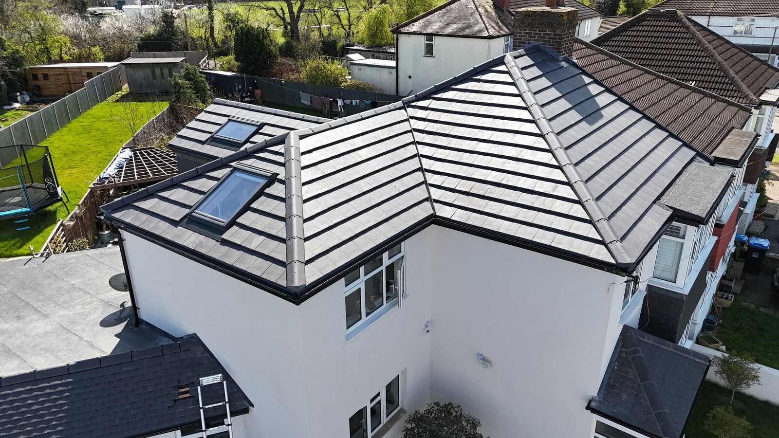 Re-roof with Velux and dry ridge rear view - Croydon