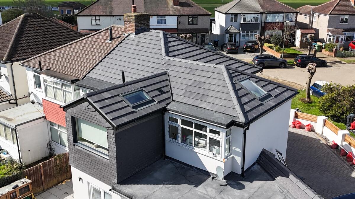 Completed re-roof with Velux windows and dry ridge - Croydon
