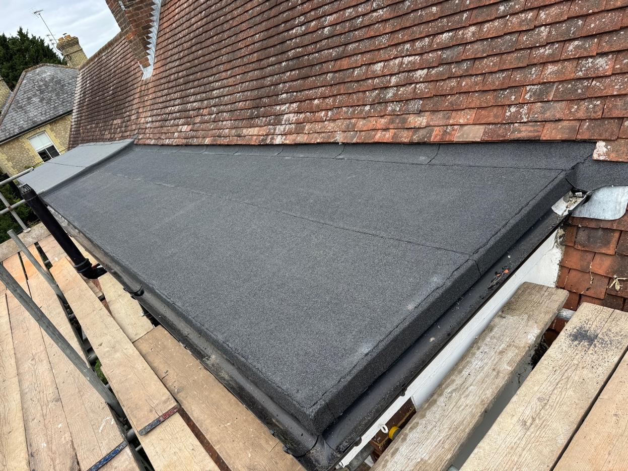 Torch-on felt flat roof from scaffolding