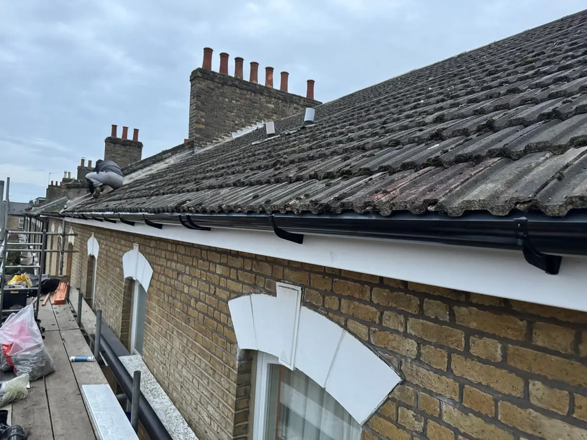 Full run of new fascias and guttering from scaffold