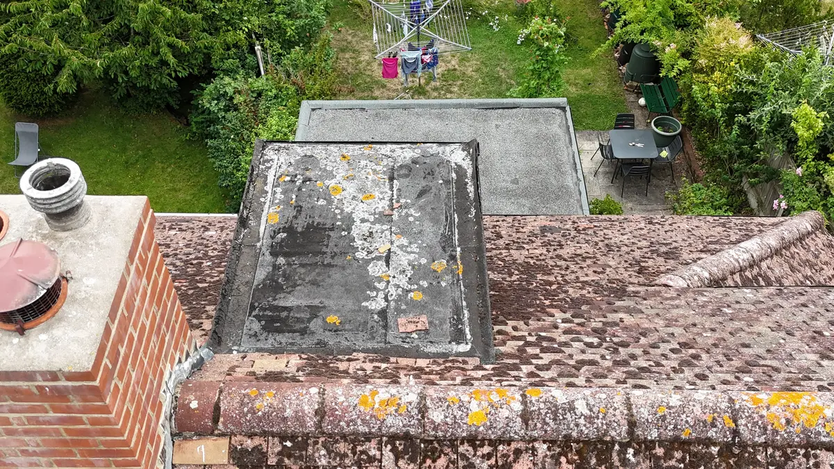 Drone survey revealing deteriorated flat roof section hidden from ground level