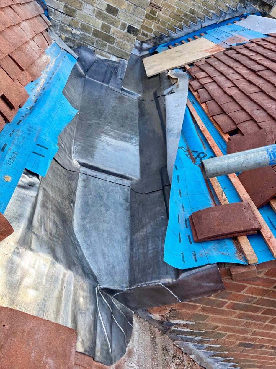 Lead back gutter installation