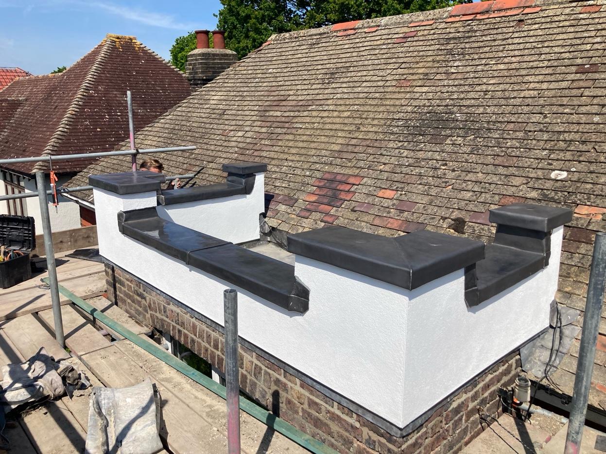 Lead parapet work — wider view with scaffold