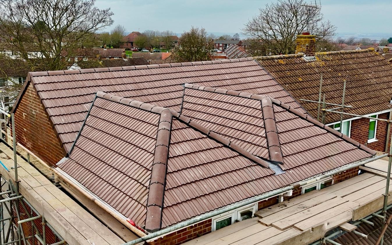 Complete tile re-roof with dry ridge and hips