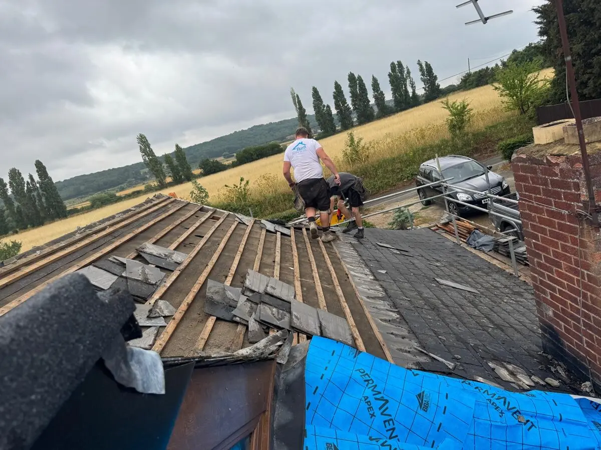 Roof strip from scaffolding showing safe working