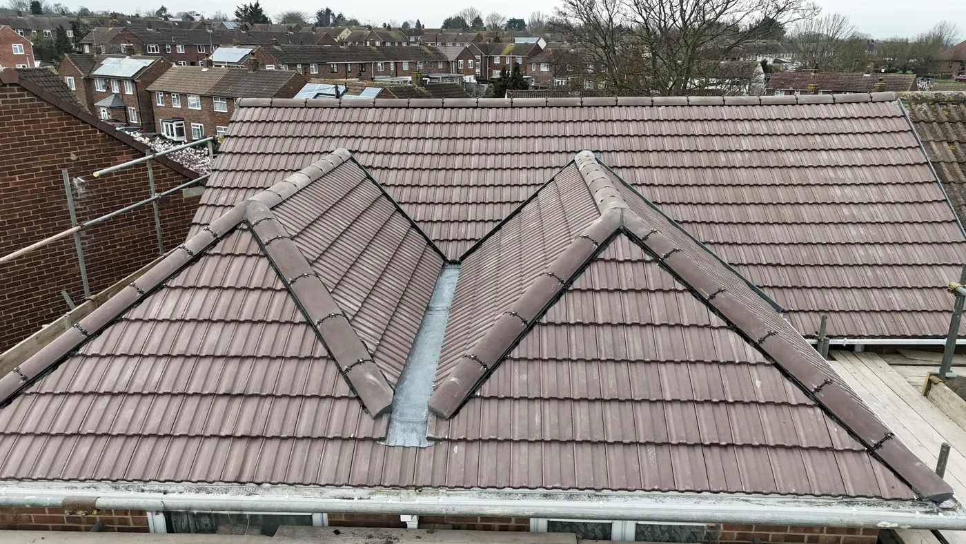 Hip and valley re-roof with lead valley gutter - Sidcup