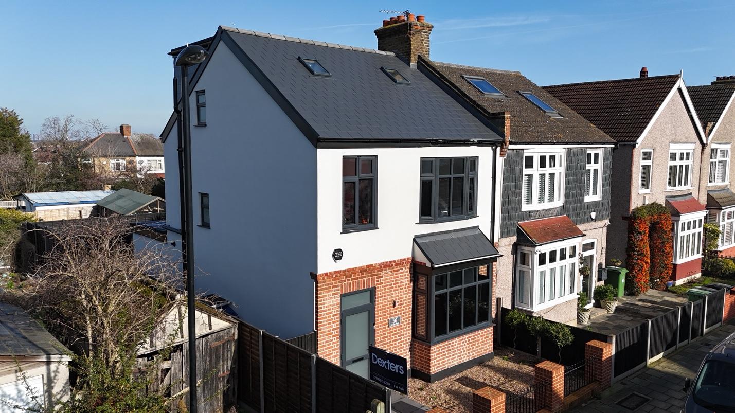 Slate re-roof with new fascias — drone view
