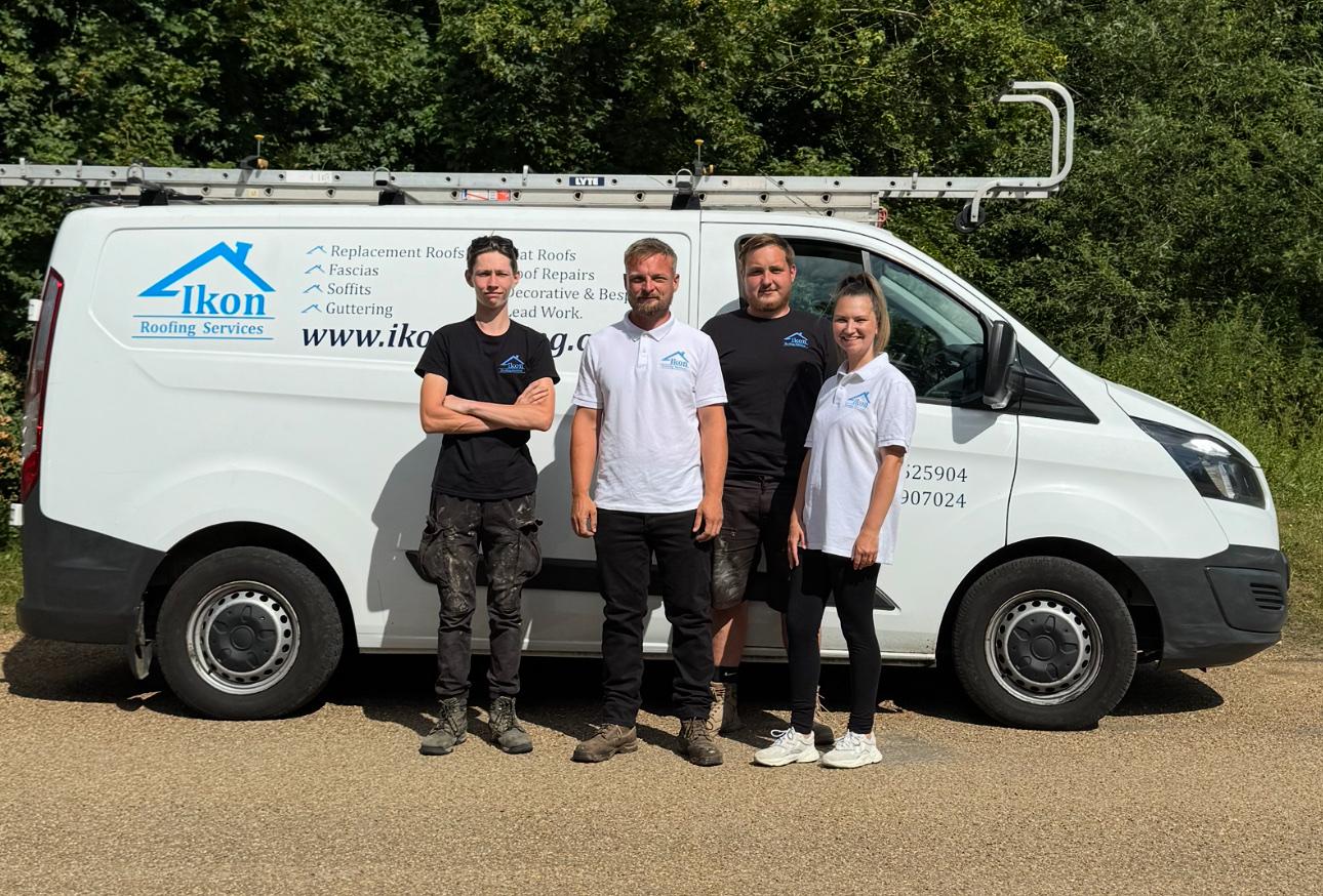 The Ikon Roofing team in front of branded van