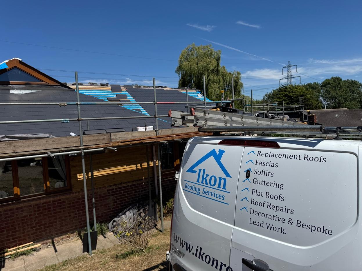 Ikon Roofing van arriving for emergency repair